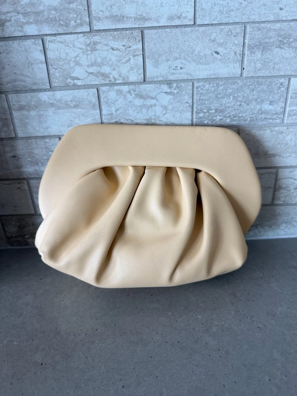 NWT Anthropologie Elegant light soft yellow Gathered Leather Clutch